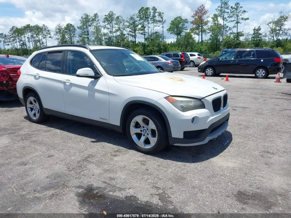 2015 BMW X1 sDrive28i, VIN WBAVM1C53FVW57696 — Engine fire