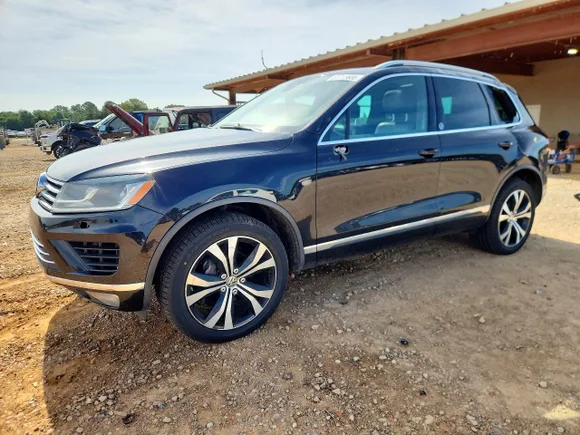 2017 Volkswagen Touareg Wolfsburg Edition, VIN WVGRF7BP8HD004466 — Rollover