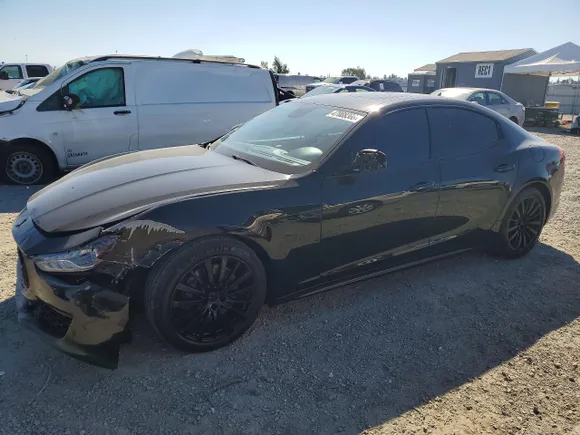 2018 Maserati Ghibli S Q4, VIN ZAM57YTA4J1301673 — Side