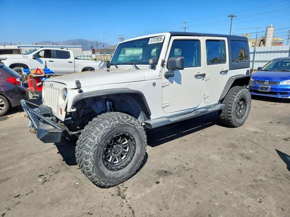 2013 Jeep Wrangler Unlimited Sport, VIN 1C4BJWDG9DL590218 — Front end