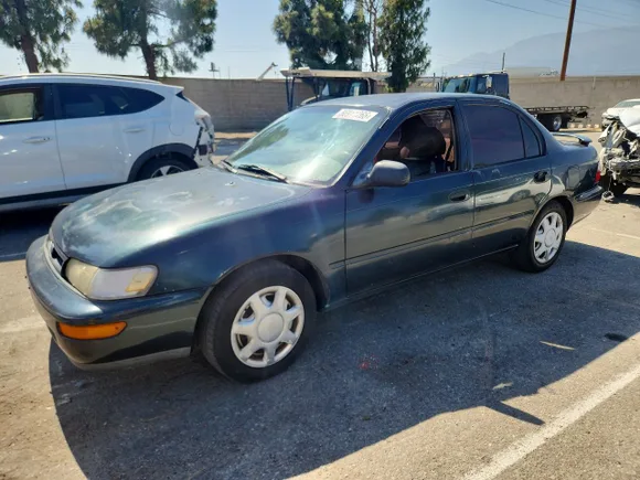 1997 Toyota Corolla, VIN 1NXBA02E8VZ621027 — Front end