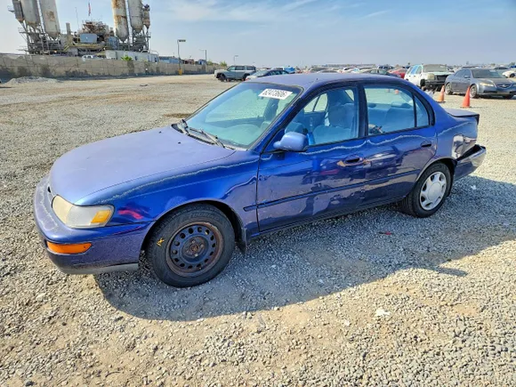 1997 Toyota Corolla DX, VIN 1NXBB02E2VZ558617 — Rear end