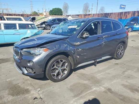 2018 BMW X1 xDrive28i, VIN WBXHT3C36J5K31137 — Rollover