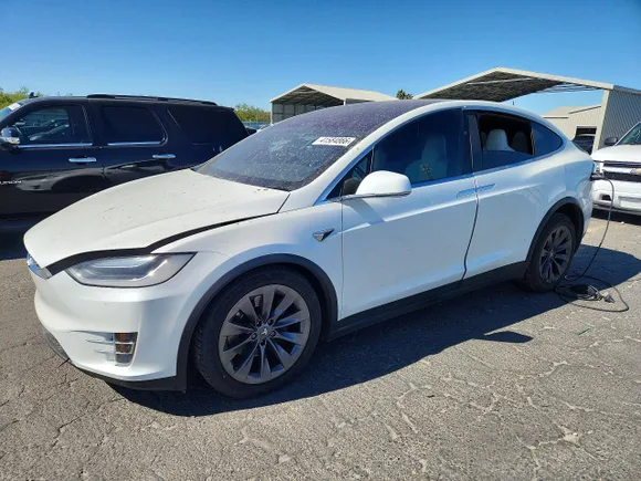 2017 Tesla Model X 90D, VIN 5YJXCBE28HF061203 — Interior fire