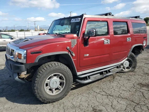 2003 Hummer H2, VIN 5GRGN23U73H128461 — Auction photo