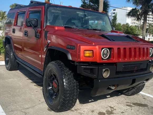 2003 Hummer H2, VIN 5GRGN23U73H149133 — Prior damage history