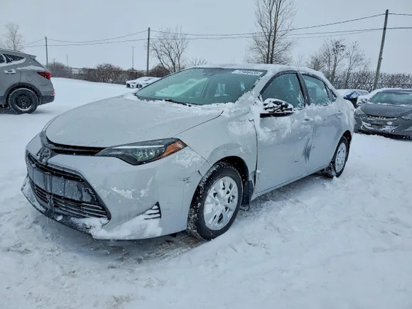 2019 Toyota Corolla LE, VIN 2T1BURHE2KC236157 — Side