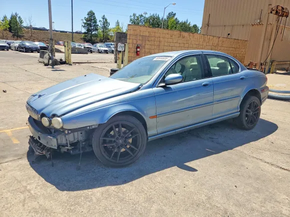 2005 Jaguar X-Type 3.0L, VIN SAJWA51AX5WE61369 — Rollover