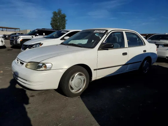 2000 Toyota Corolla CE, VIN 1NXBR12E2YZ346239 — Minor dents and scratches