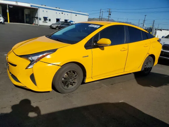 2016 Toyota Prius Four, VIN JTDKARFUXG3016753 — Side