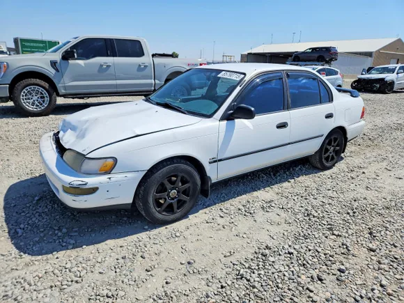 1995 Toyota Corolla DX, VIN 1NXAE09B4SZ242114 — Front end