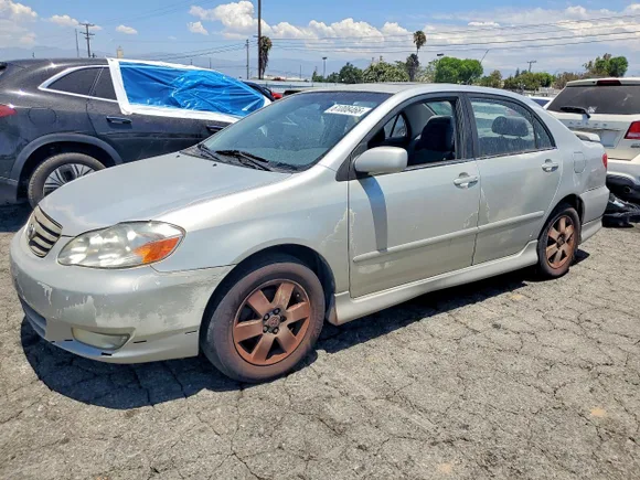 2003 Toyota Corolla LE, VIN 1NXBR32E33Z112681 — Minor dents and scratches