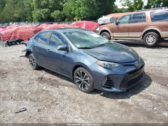 2018 Toyota Corolla LE, VIN 5YFBURHE9JP791816 — Rear end