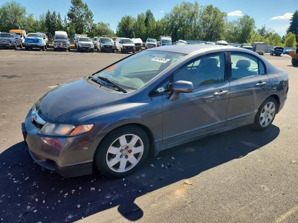 2011 Honda Civic LX, VIN 19XFA1F58BE021348 — Undercarriage