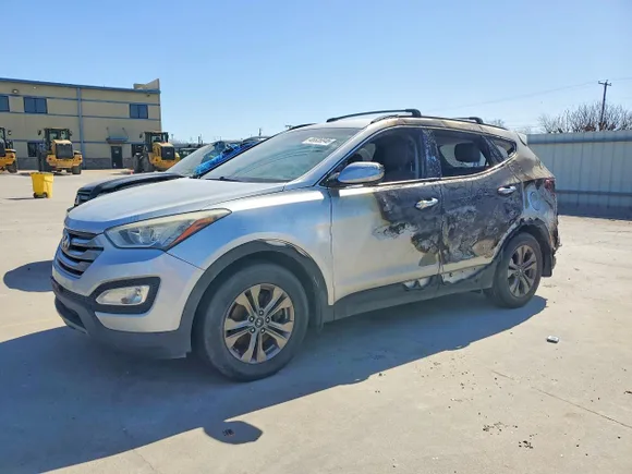 2015 Hyundai Santa Fe, VIN 5XYZU3LB1FG296644 — Burn