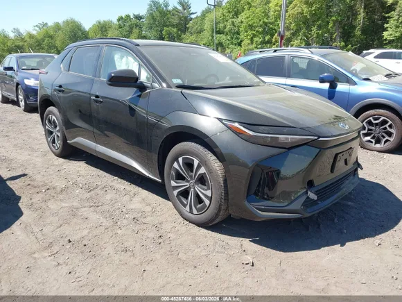 2025 Toyota bZ4X XLE, VIN JTMAAAAAXSA073369 — Side