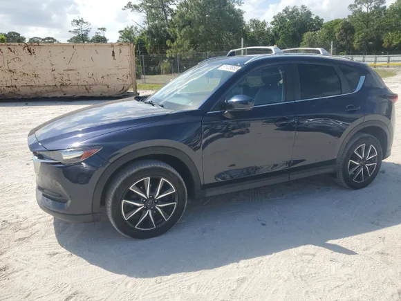 2018 Mazda CX-5 Touring, VIN JM3KFACM5J0419207 — Partial repair