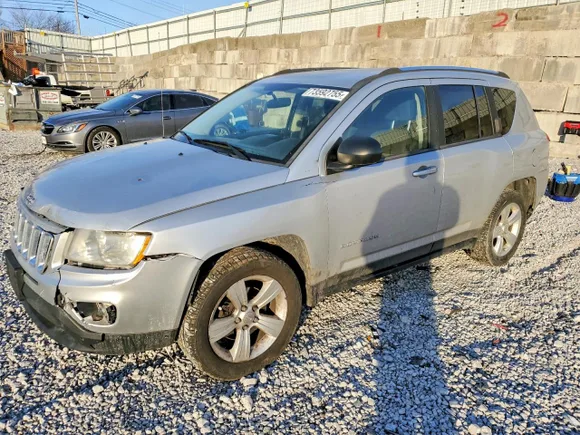 2012 Jeep Compass Sport, VIN 1C4NJDBB7CD562399 — Side