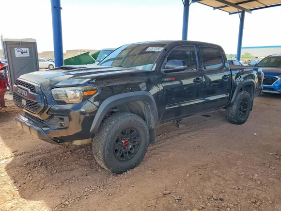 2019 Toyota Tacoma TRD Pro, VIN 5TFCZ5AN9KX186058 — Side