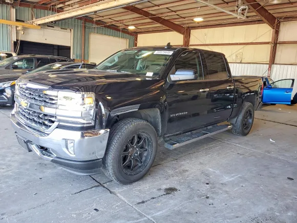 2018 Chevrolet Silverado 1500 LTZ, VIN 3GCUKSEJ9JG600392 — Minor dents and scratches