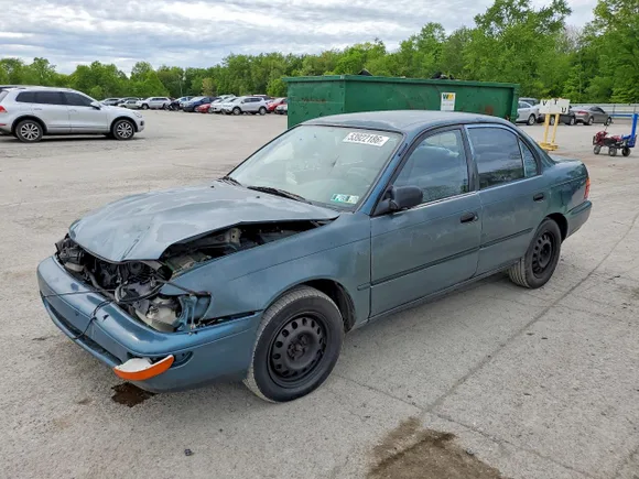 1995 Toyota Corolla DX, VIN 2T1AE09B9SC124710 — Front end