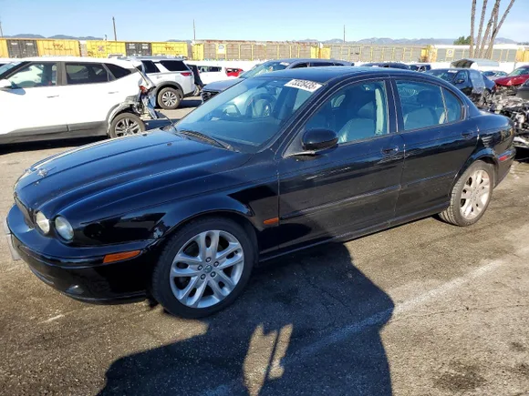 2003 Jaguar X-Type Sport, VIN SAJEA53D83XC92799 — Minor dents and scratches