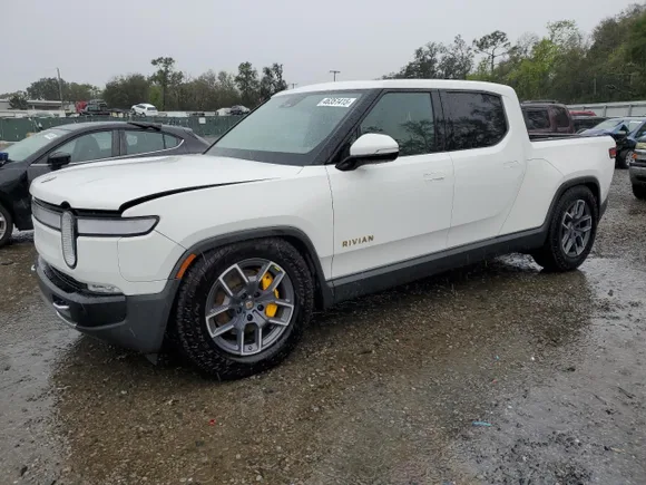 2023 Rivian R1T Adventure, VIN 7FCTGAAA2PN021915 — Water / flood