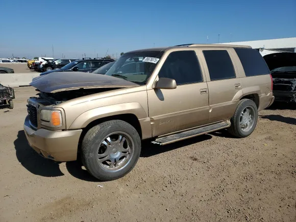 1999 GMC Denali, VIN 1GKEK13R3XR913863 — Side
