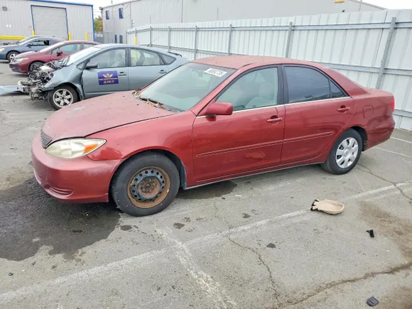 2002 Toyota Camry XLE, VIN 4T1BE30K52U001178 — Minor dents and scratches
