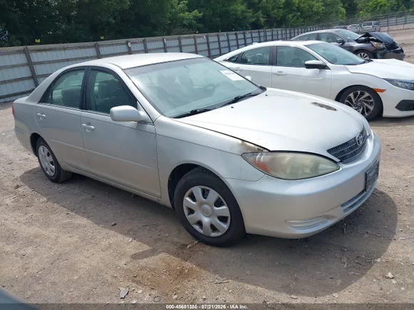 2004 Toyota Camry LE, VIN 4T1BE32K44U826726 — Engine fire