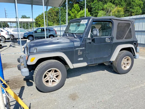 2002 Jeep Wrangler SE, VIN 1J4FA29P82P729340 — Normal wear
