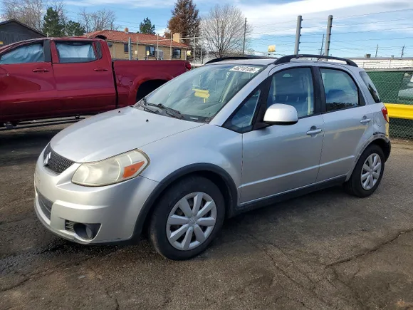 2010 Suzuki SX4, VIN JS2YB5A35A6301337 — Hail