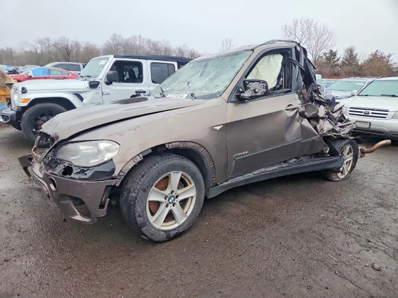 2013 BMW X5 xDrive35i, VIN 5UXZV4C58D0B14262 — Rollover
