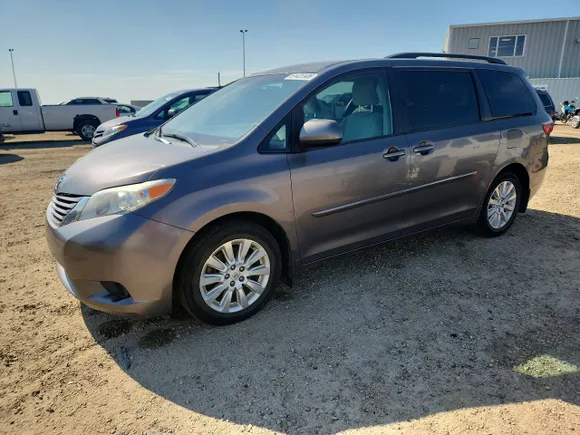 2015 Toyota Sienna LE, VIN 5TDJK3DC8FS112409 — Water / flood