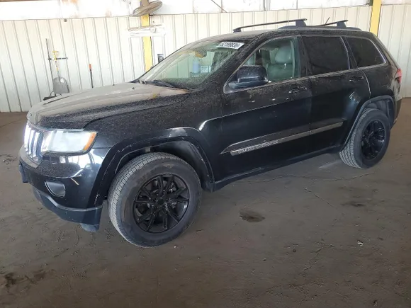 2013 Jeep Grand Cherokee Laredo, VIN 1C4RJFAG8DC604225 — Side