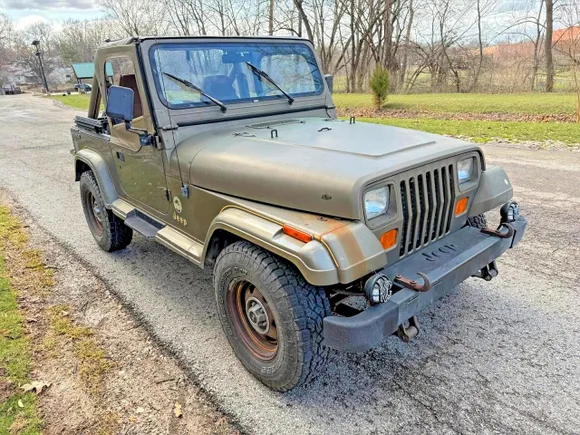 1989 Jeep Wrangler, VIN 2J4FY49T3KJ115751 — Minor dents and scratches