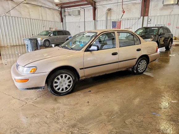 1995 Toyota Corolla, VIN 1NXAE04B3SZ324374 — Rear end