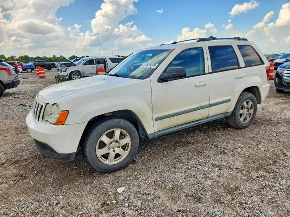 2009 Jeep Grand Cherokee Laredo, VIN 1J8GS48KX9C512634 — Normal wear