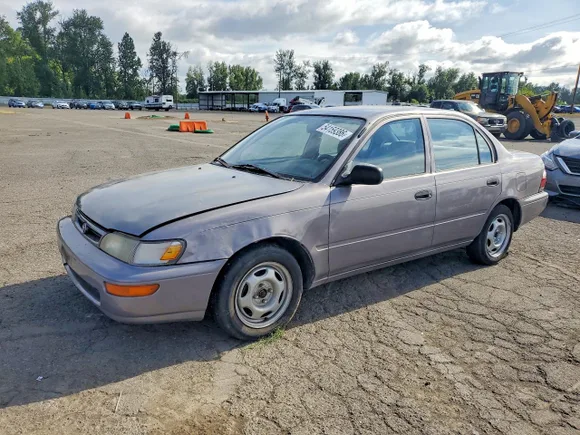 1997 Toyota Corolla, VIN 1NXBA02E7VZ599554 — Side