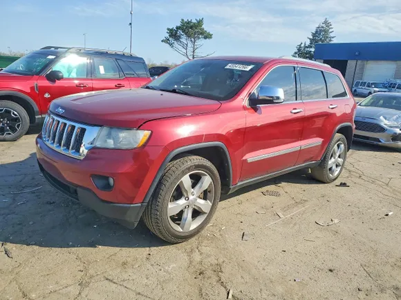 2012 Jeep Grand Cherokee Overland, VIN 1C4RJFCT2CC241350 — Side