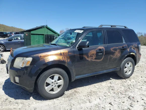 2011 Mercury Mariner, VIN 4M2CN9BG5BKJ01307 — Vandalism