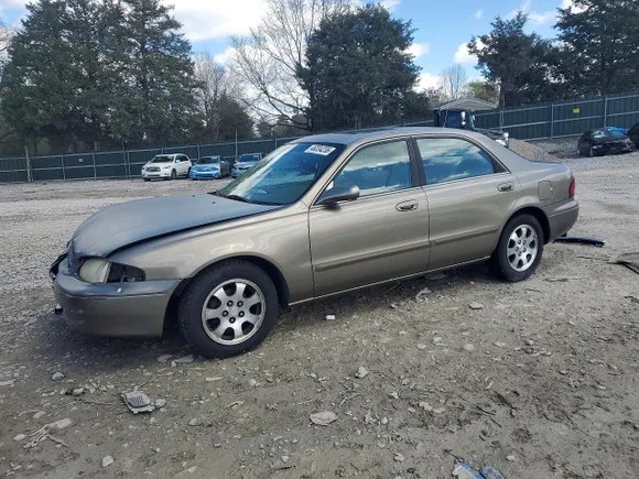 1998 Mazda 626 DX, VIN 1YVGF22C8W5773403 — Front end