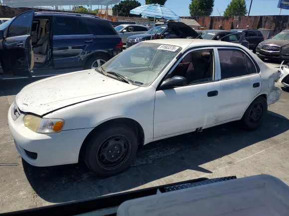 2002 Toyota Corolla LE, VIN 1NXBR12E12Z602720 — Rear end