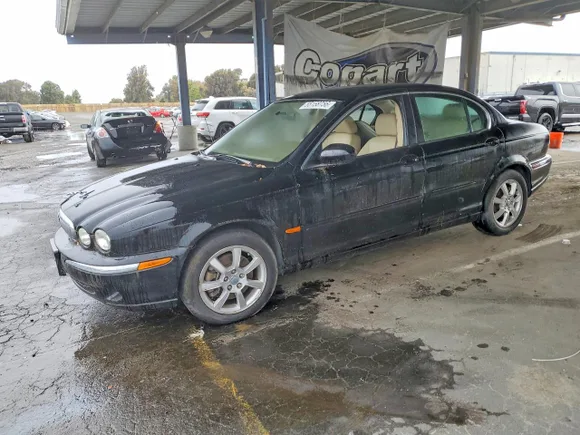 2005 Jaguar X-Type 3.0L, VIN SAJWA51A15WE58408 — Minor dents and scratches