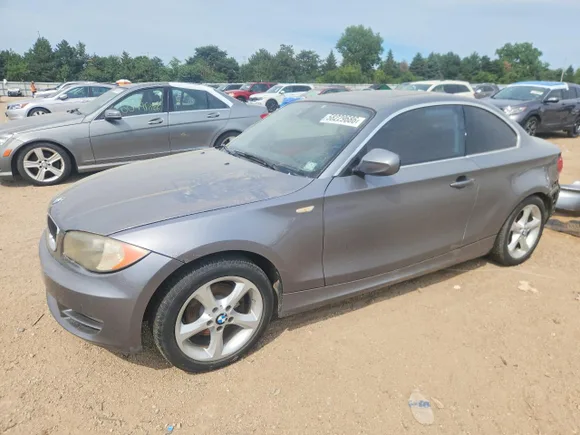 2011 BMW 1 Series 128i, VIN WBAUP7C52BVM54377 — Rear end
