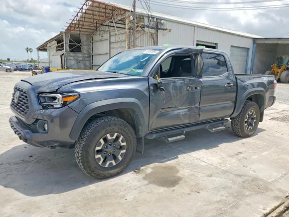 2021 Toyota Tacoma TRD Off Road, VIN 3TMCZ5AN7MM440066 — Side