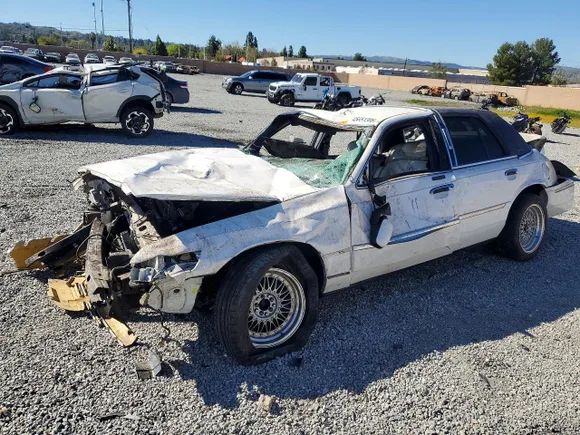 1998 Mercury Grand Marquis LS, VIN 2MEFM75W3WX658781 — Rollover
