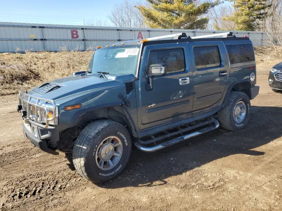 2005 Hummer H2 SUV, VIN 5GRGN23U25H110386 — Engine fire