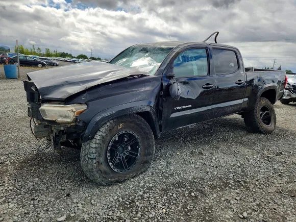 2016 Toyota Tacoma SR5, VIN 3TMDZ5BN1GM001971 — Rollover