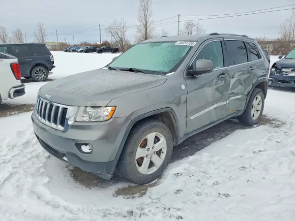 2013 Jeep Grand Cherokee Laredo, VIN 1C4RJFAG9DC512816 — Side